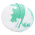 A bath bomb with a swirled green and white color design, with a predominantly white base color.