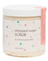 A jar of Whipped Sugar Scrub with a label that reads 'for soft and yummy skin' and has colorful polka dots.