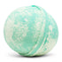 A green-colored bath bomb with a textured surface, against a white background